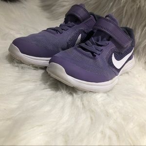 Purple and white Nike